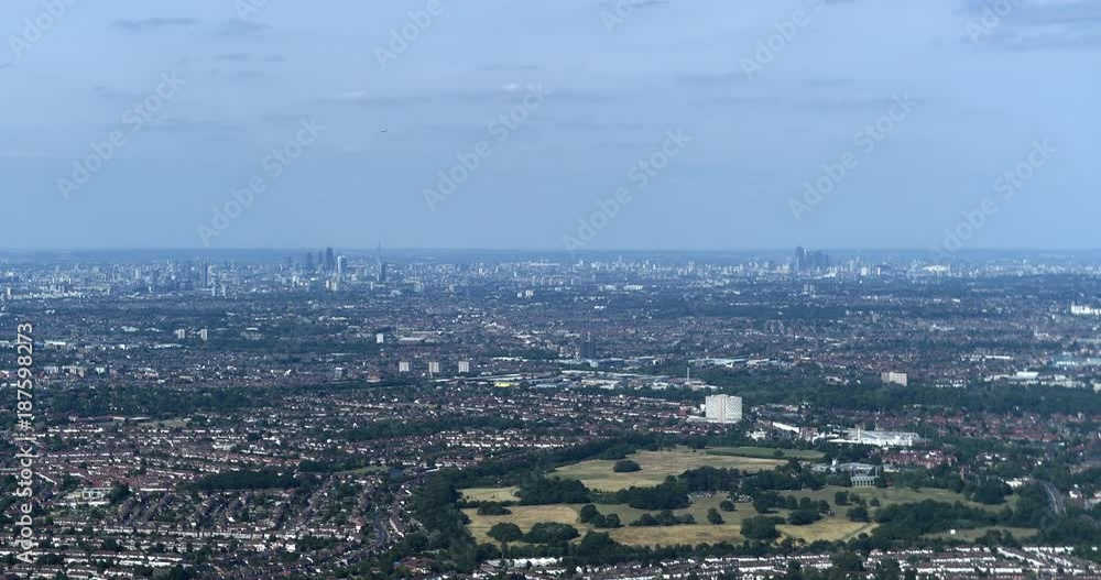 London,England,UK – July 2015 : Aerial shot over London on a sunny day with Skyline in view London,England,UK – July 2015 : Aerial shot over London on a sunny day with Skyline in view