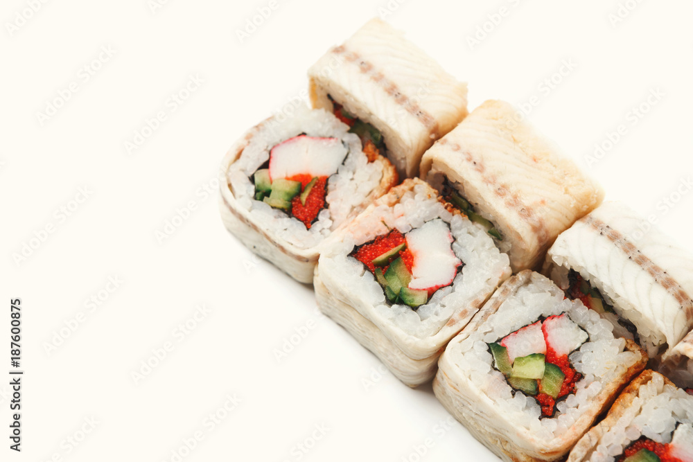 Set of unagi eel rolls isolated on white, closeup, top view Set of unagi eel rolls isolated on white, closeup, top view