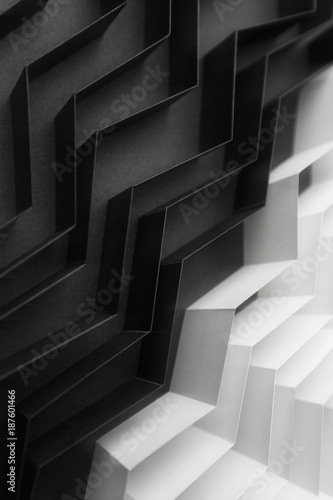 Black and white abstract background with stripes of paper