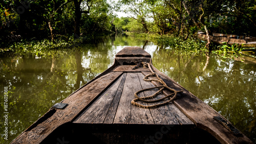 boat on the canal of the Mekong Delta in Asia