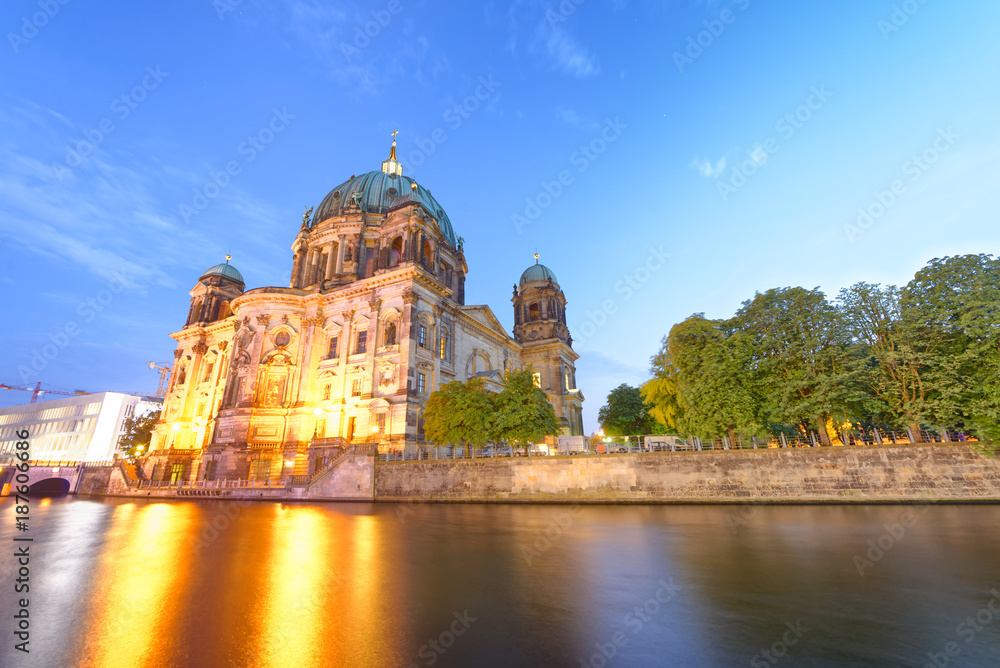 Sunset view of Berliner Dom along Spree river. City Cathedral in summer