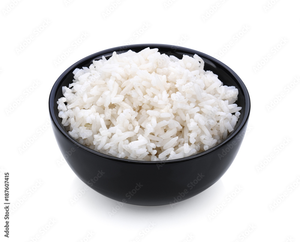 Rice in a bowl on white background Rice in a bowl on white background
