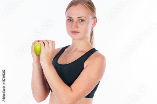 Girl with a green apple in her hand