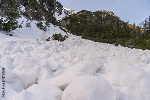 Snow lumps after descent of avalanche. High Tatras. Poland
