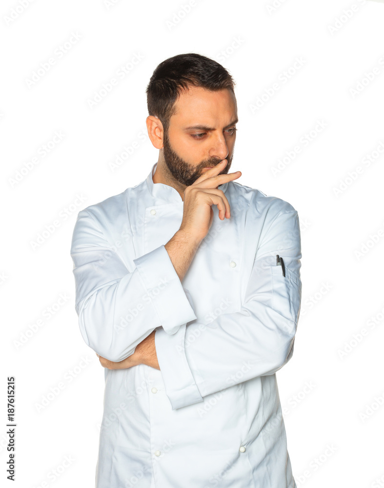 Young chef on white background.