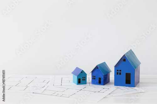 blue paper houses on white background