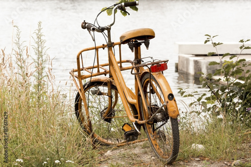 Canvas Print Orange Bicycle near the Water