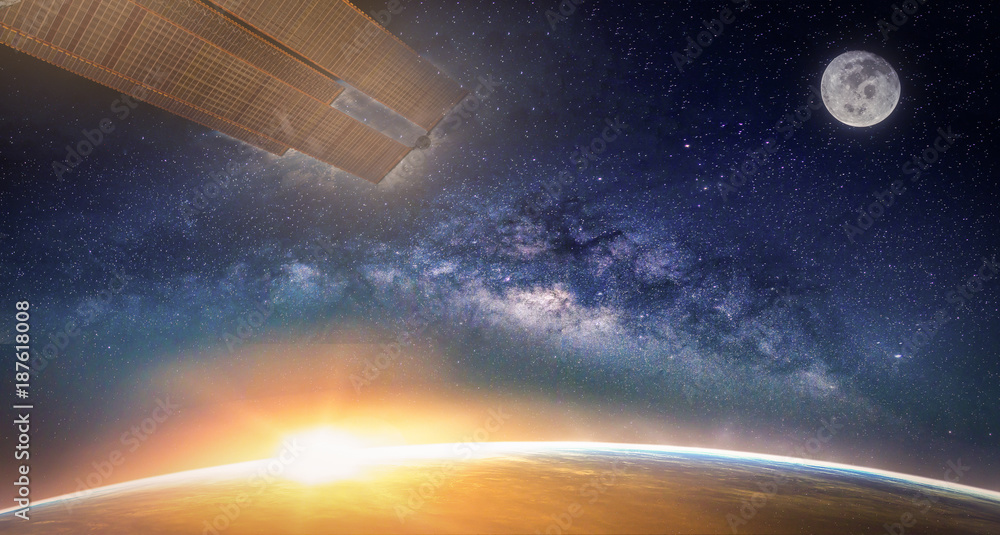 Naklejka premium Landscape with Milky way galaxy. Sunrise, Earth, moon and satellite view from space with Milky way galaxy. (Elements of this image furnished by NASA)