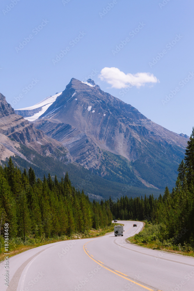 Scenic Icefields Parkway highway in Rocky Mountains, Alberta, Canada on sunny day Scenic Icefields Parkway highway in Rocky Mountains, Alberta, Canada on sunny day
