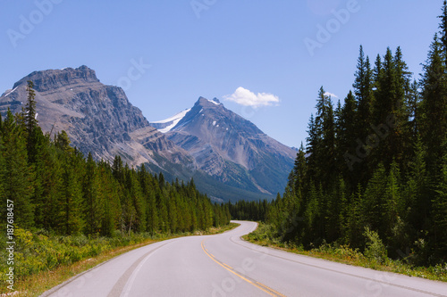 Scenic Icefields Parkway highway in Rocky Mountains, Alberta, Canada on sunny day