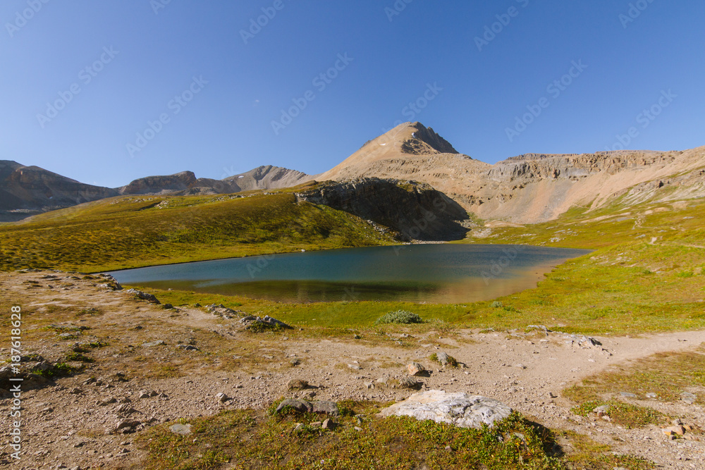 Remote lake above tree line in Rocky Mountains, Canada