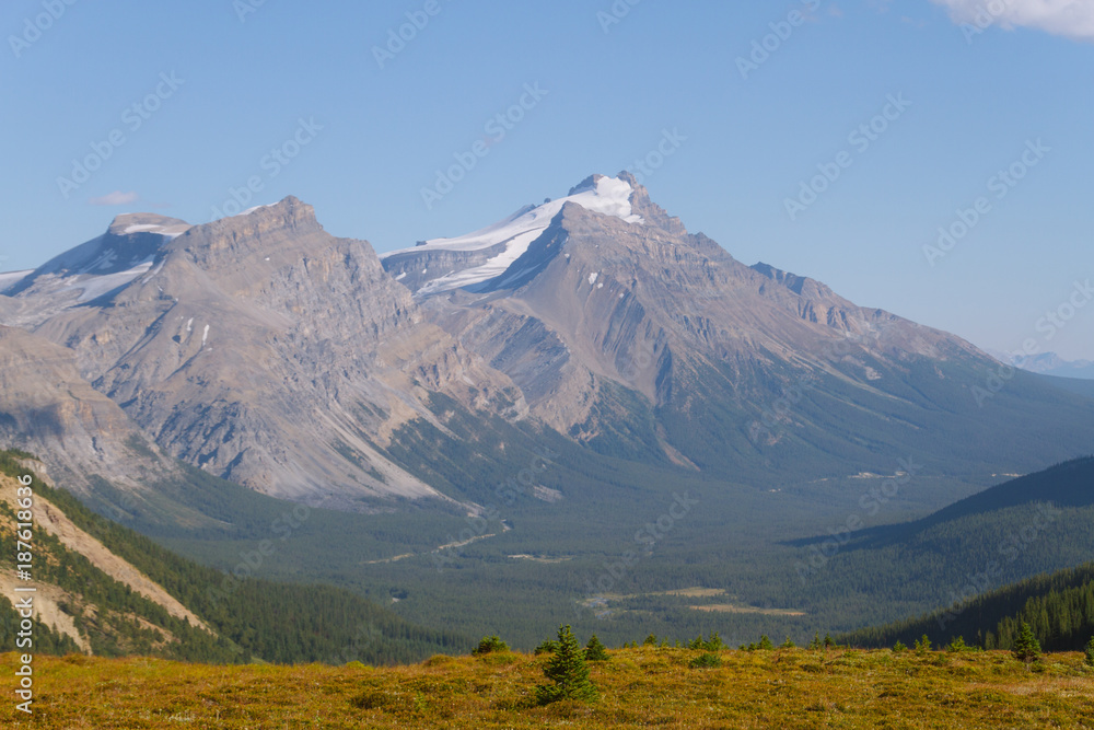 Beautiful hike trail above tree line in Rocky Mountains in Canada on sunny day Beautiful hike trail above tree line in Rocky Mountains in Canada on sunny day