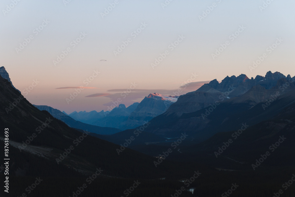 Scenic valley with river in Rocky Mountains in Canada during sunrise