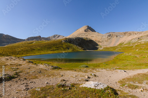 Remote lake above tree line in Rocky Mountains  Canada