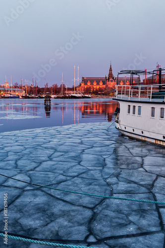 Winter landscape with boat ...