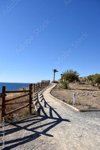 Walking path along spanish sea coastline