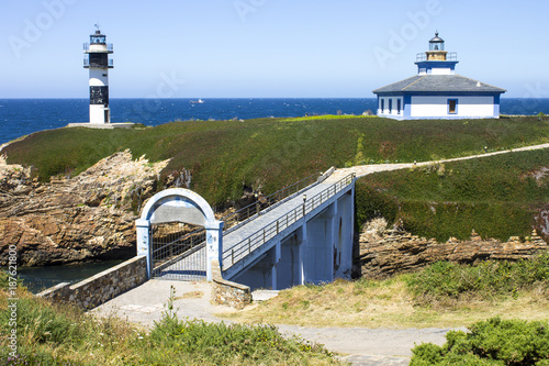 Illa Pancha in Ribadeo, Spain, a beautiful island with two lighthouses guarding the Eo estuary that delimits the border between Galicia and Asturias photo