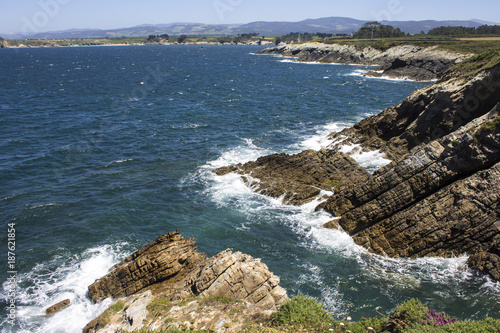 Illa Pancha in Ribadeo, Spain, a beautiful island with two lighthouses guarding the Eo estuary that delimits the border between Galicia and Asturias photo