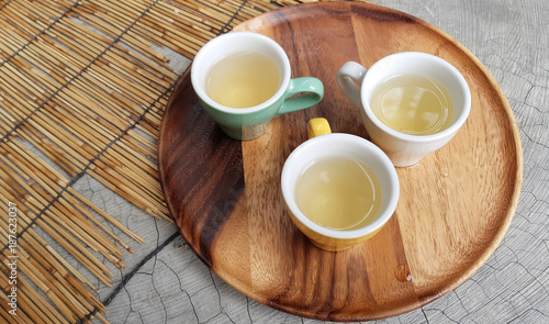 Little yellow cup of white tea