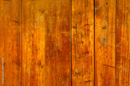 Texture of old ginger wooden plank. Natural wood background
