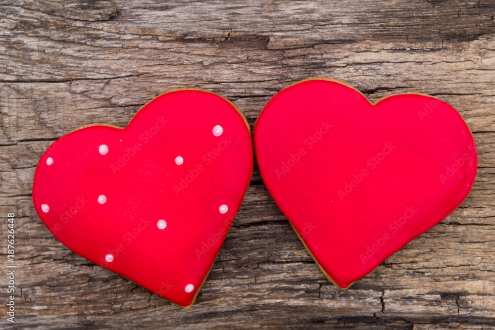 Heart shaped cookie for valentine day on rustic wooden table Heart shaped cookie for valentine day on rustic wooden table