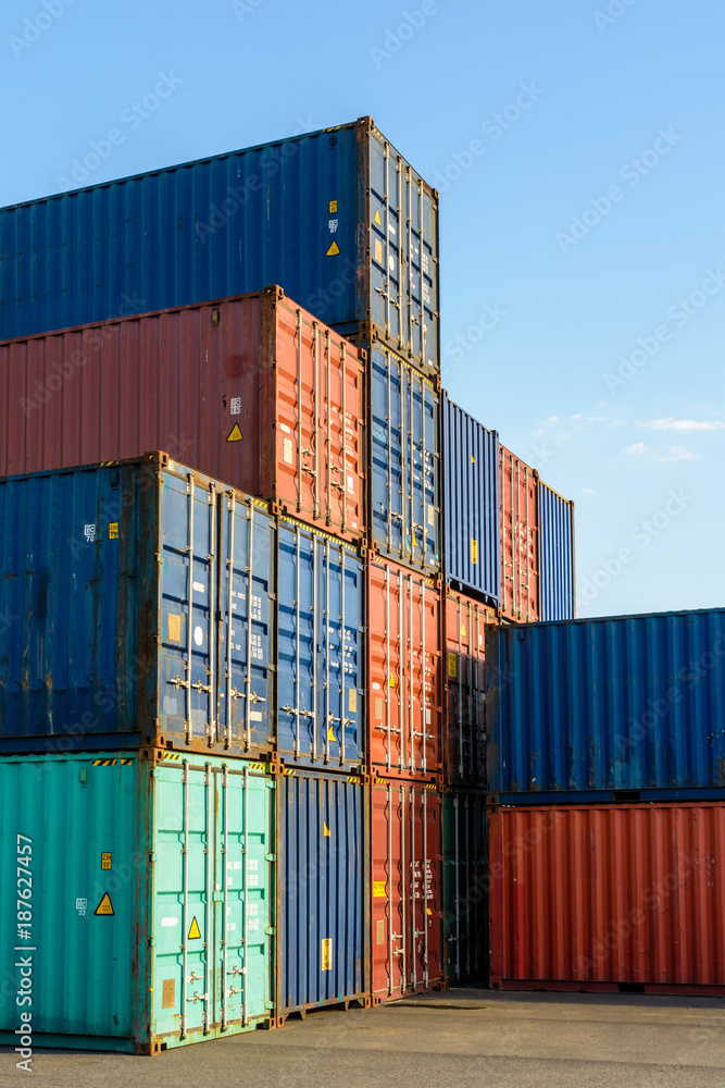Dozens of dry cargo containers stacked in an intermodal terminal on the river Marne in the inner suburbs of Paris. Dozens of dry cargo containers stacked in an intermodal terminal on the river Marne in the inner suburbs of Paris.