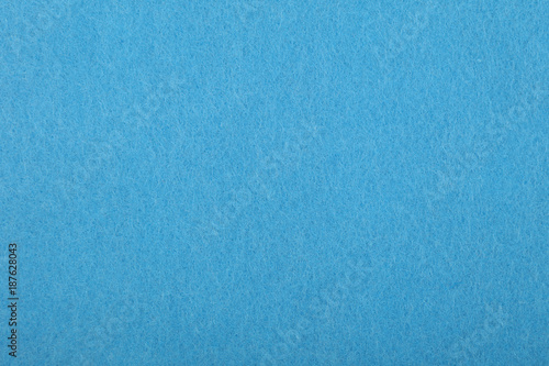 Blue felt background texture close up photo