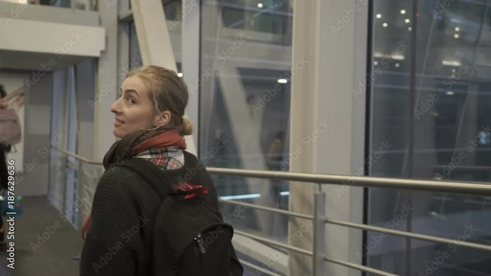 Young girl in airport ready for new adventures Young girl in airport ready for new adventures