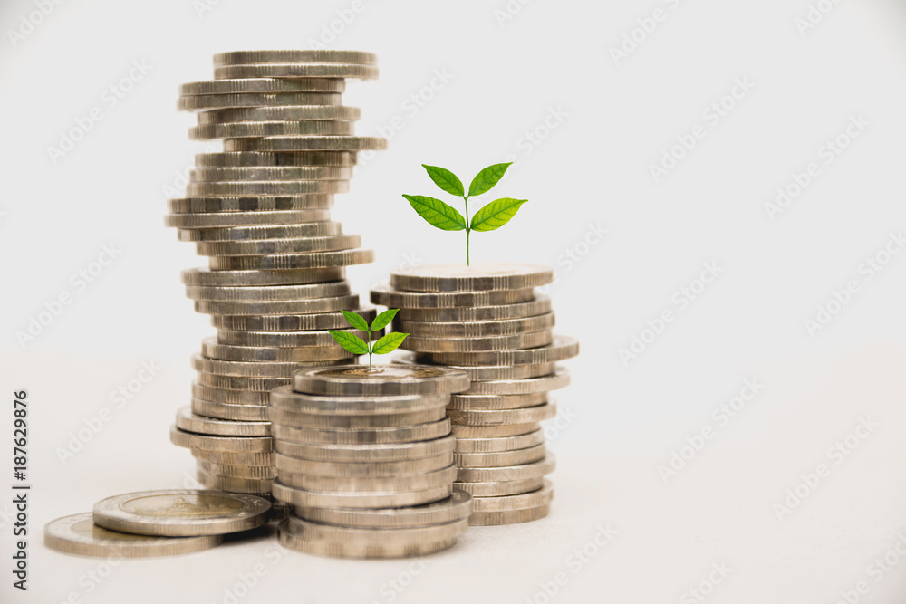 Saving money concept with money coin stack growing for business. Saving money concept with money coin stack growing for business.