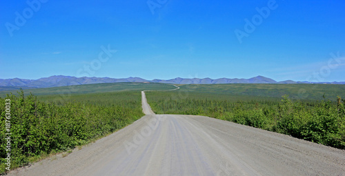 Endless Dempster Highway near the arctic circle, remote gravel road leading from Dawson City to Inuvik, Canada photo