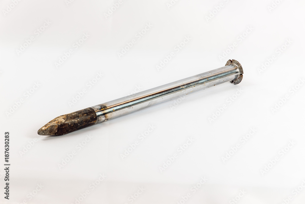 A stone chisel isolated on white background A stone chisel isolated on white background