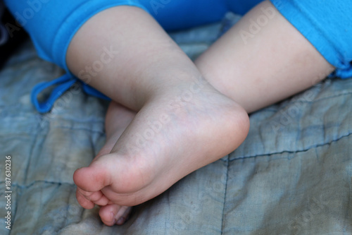 Barefooted baby legs