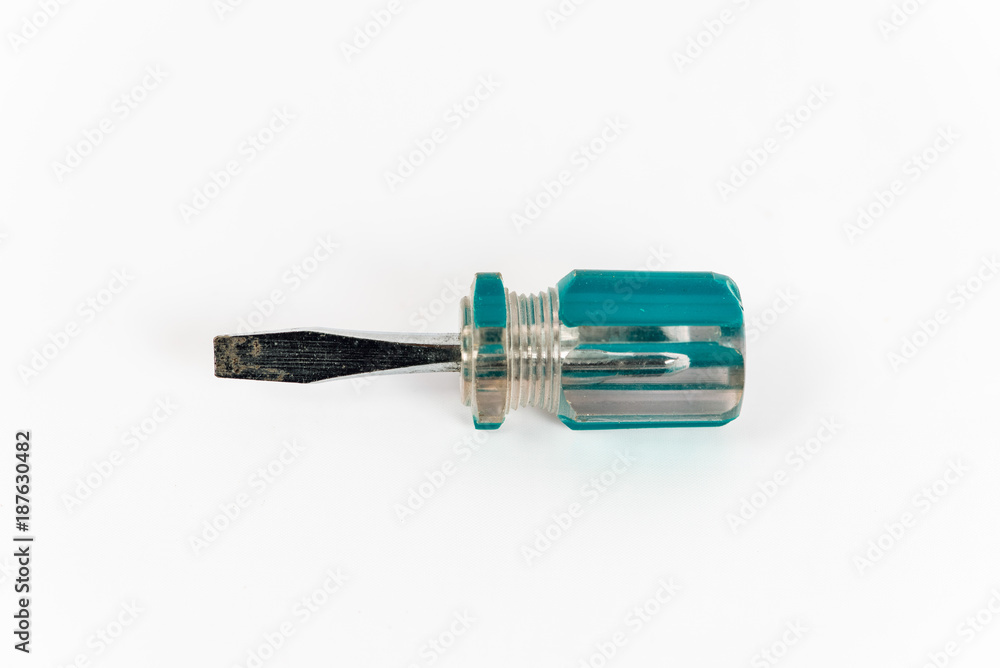 An old small screw driver isolated on white background An old small screw driver isolated on white background
