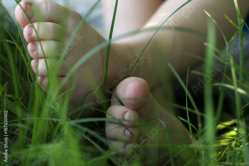 Barefooted baby legs