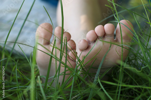 Barefooted baby legs