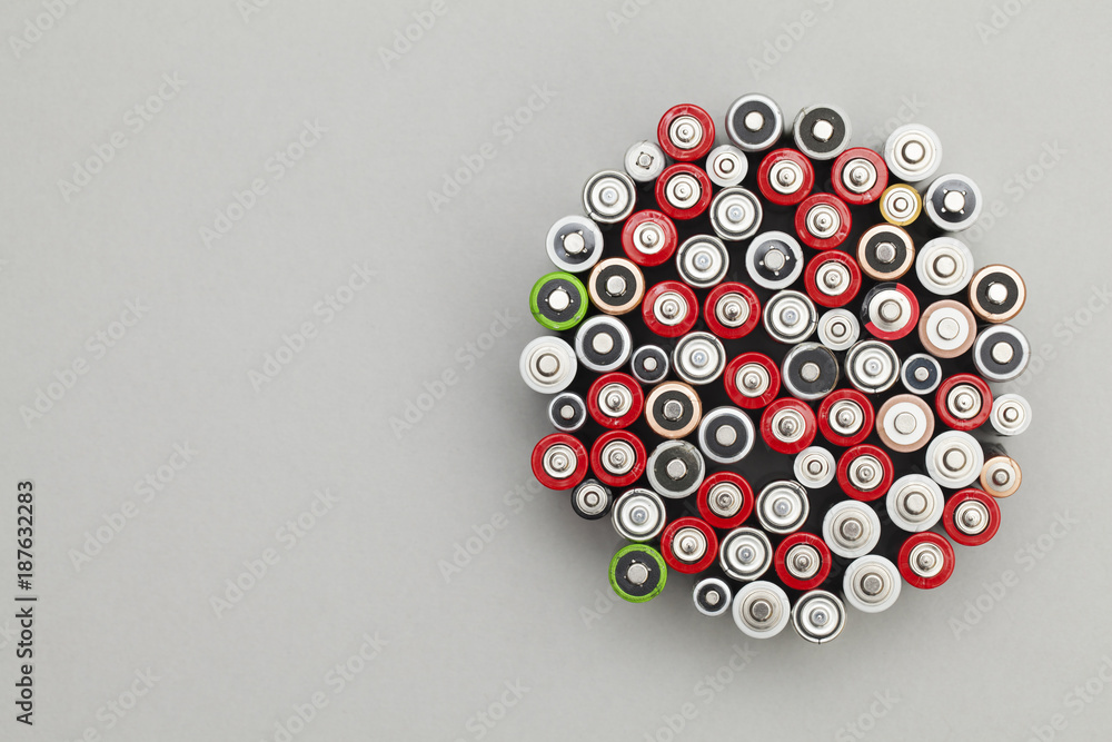 Batteries background. Energy supply and recycling concept Batteries background. Energy supply and recycling concept