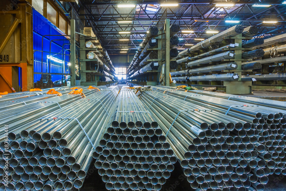 Old factory of auto components production. Warehouse of an aluminum pipes