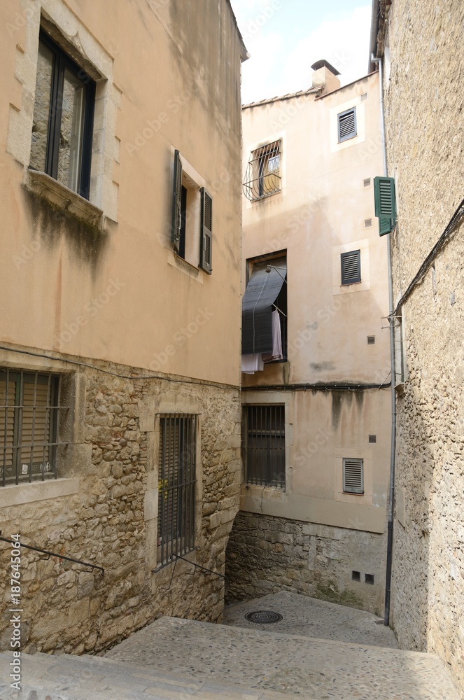 Narrow alley in Girona, Catalonia, Spain
