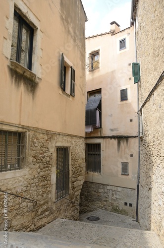 Narrow alley in Girona, Catalonia, Spain © monysasi