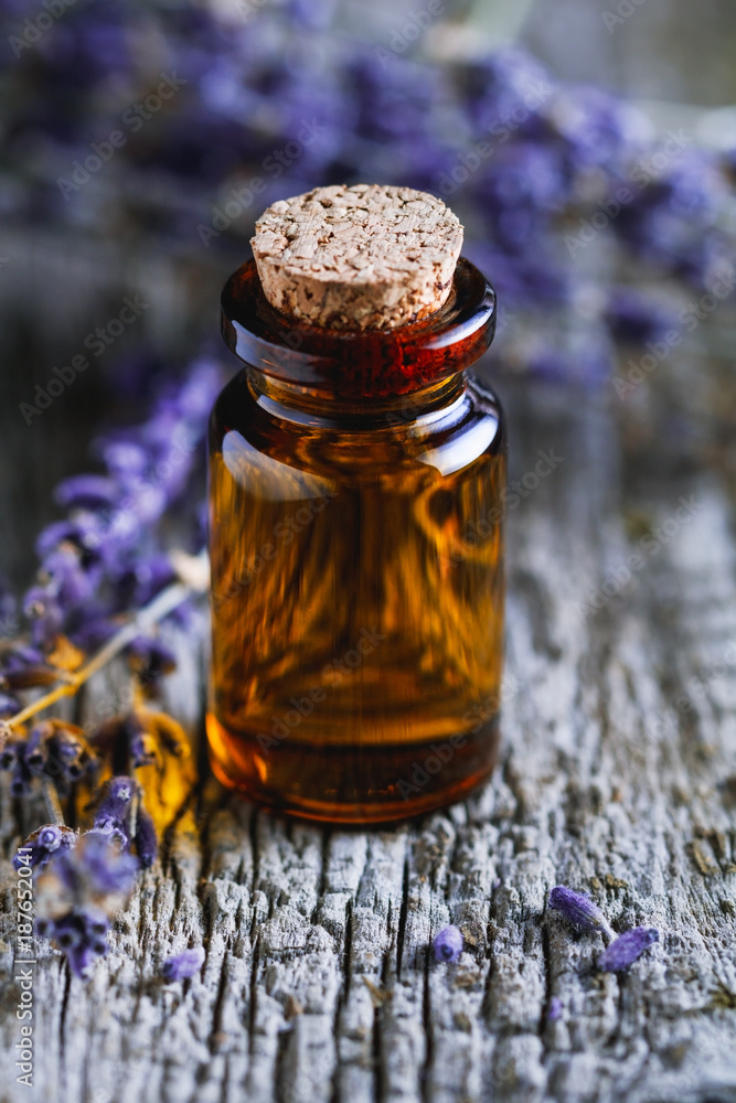 Close-up of lavender oil in the small glass jar. Cosmetic concept. Close-up of lavender oil in the small glass jar. Cosmetic concept.