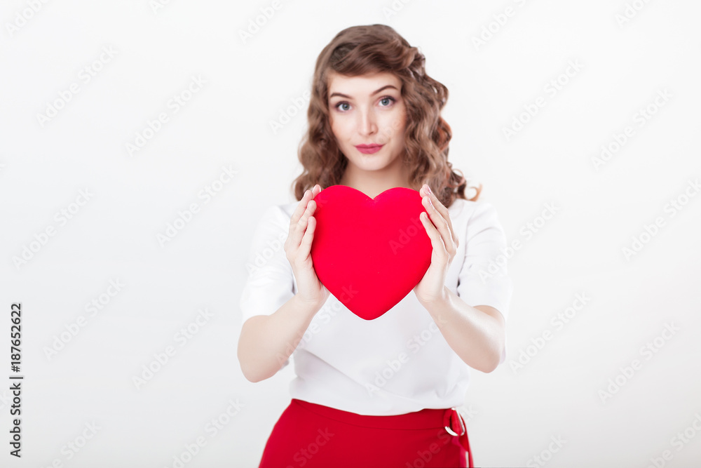woman holding red heart woman holding red heart