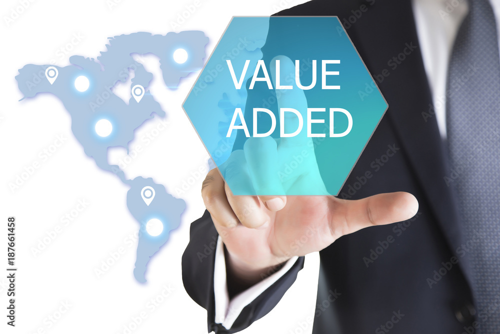 Businessman hand touching VALUE ADDED button on virtual screen