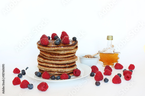 Wholemeal pancakes with fresh fruit and maple syrup