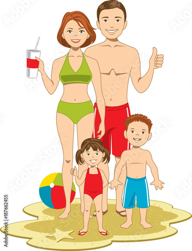 Healthy young family of four enjoying a day at the beach