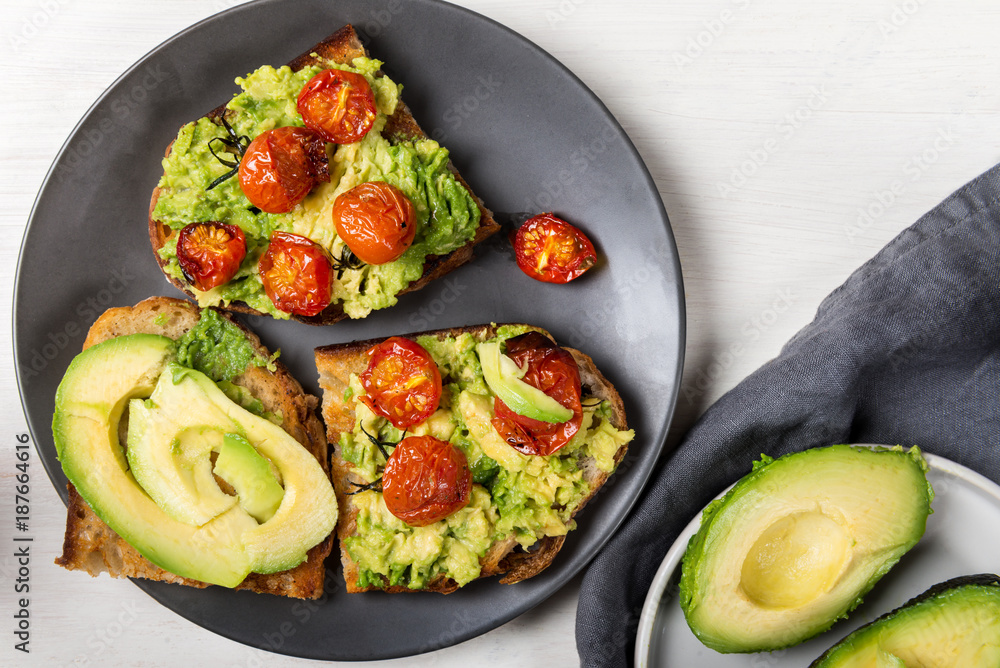 Avocado and roasted tomatoes toasts Avocado and roasted tomatoes toasts