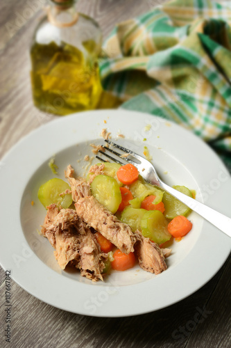 fillets of mackerel in oil with vegetable garnish