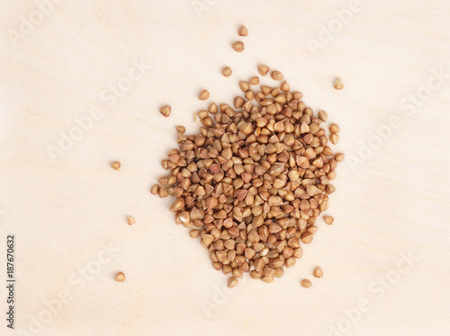 Buckwheat on a wooden surface.