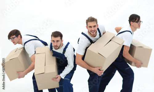 Tableau sur toile Movers in a hurry to do their job.