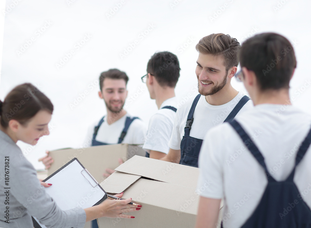 Manager and movers isolated on white background. Manager and movers isolated on white background.