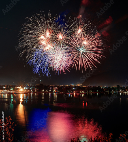 Beautiful firework display for celebration on the Grda Lake,italy,Brightly Colorful Fireworks